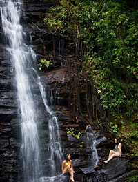 girls at waterfall